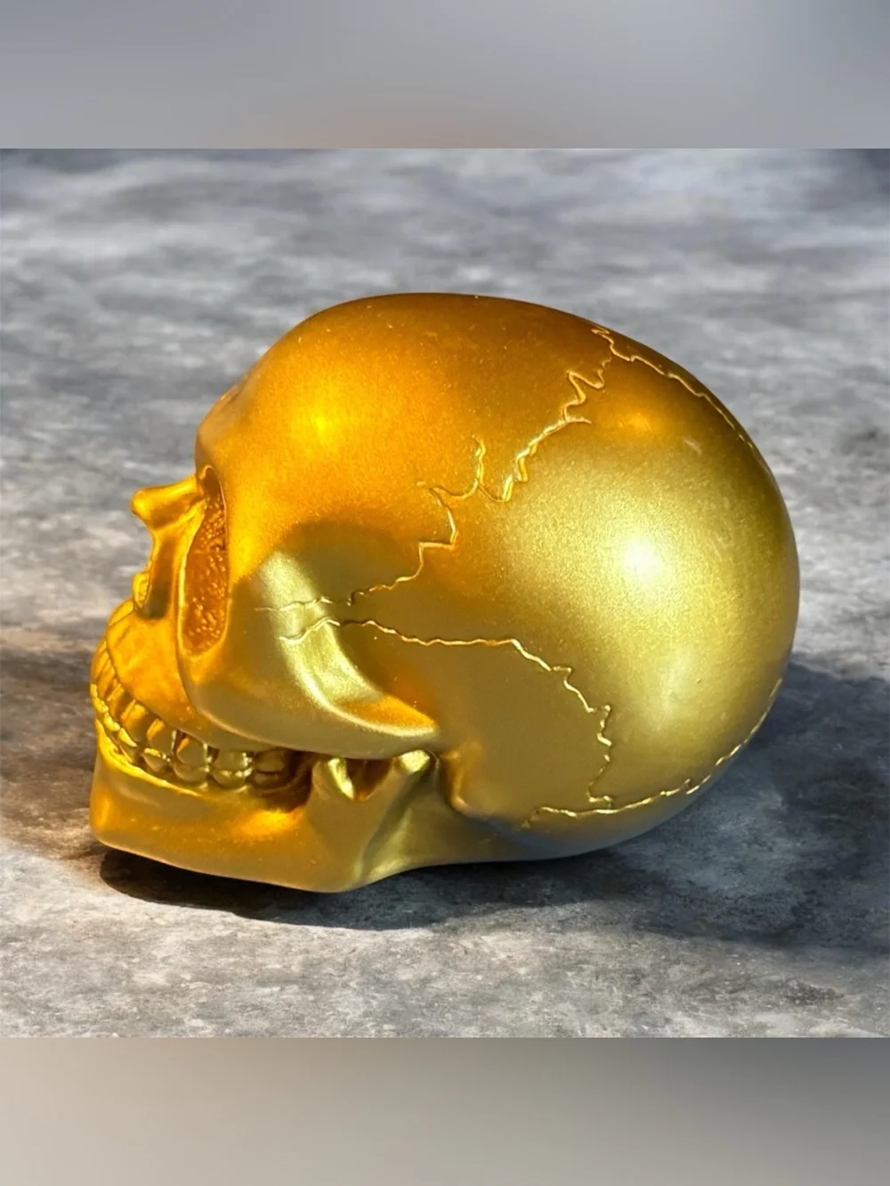 N/A gold skull